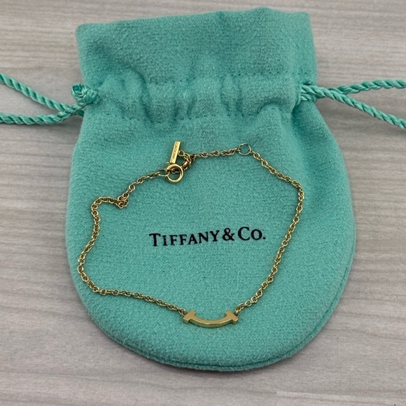 Tiffany & Co. 750 Yellow Gold smile Bracelet. - Picture 1 of 7
